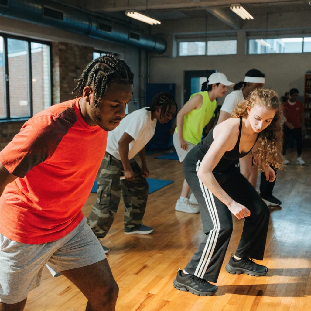 Local fitness class with people exercising together